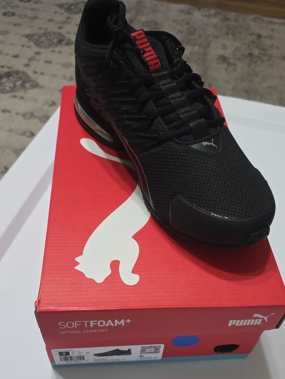 Puma Black Athletic Sneaker with Red Logo Accent